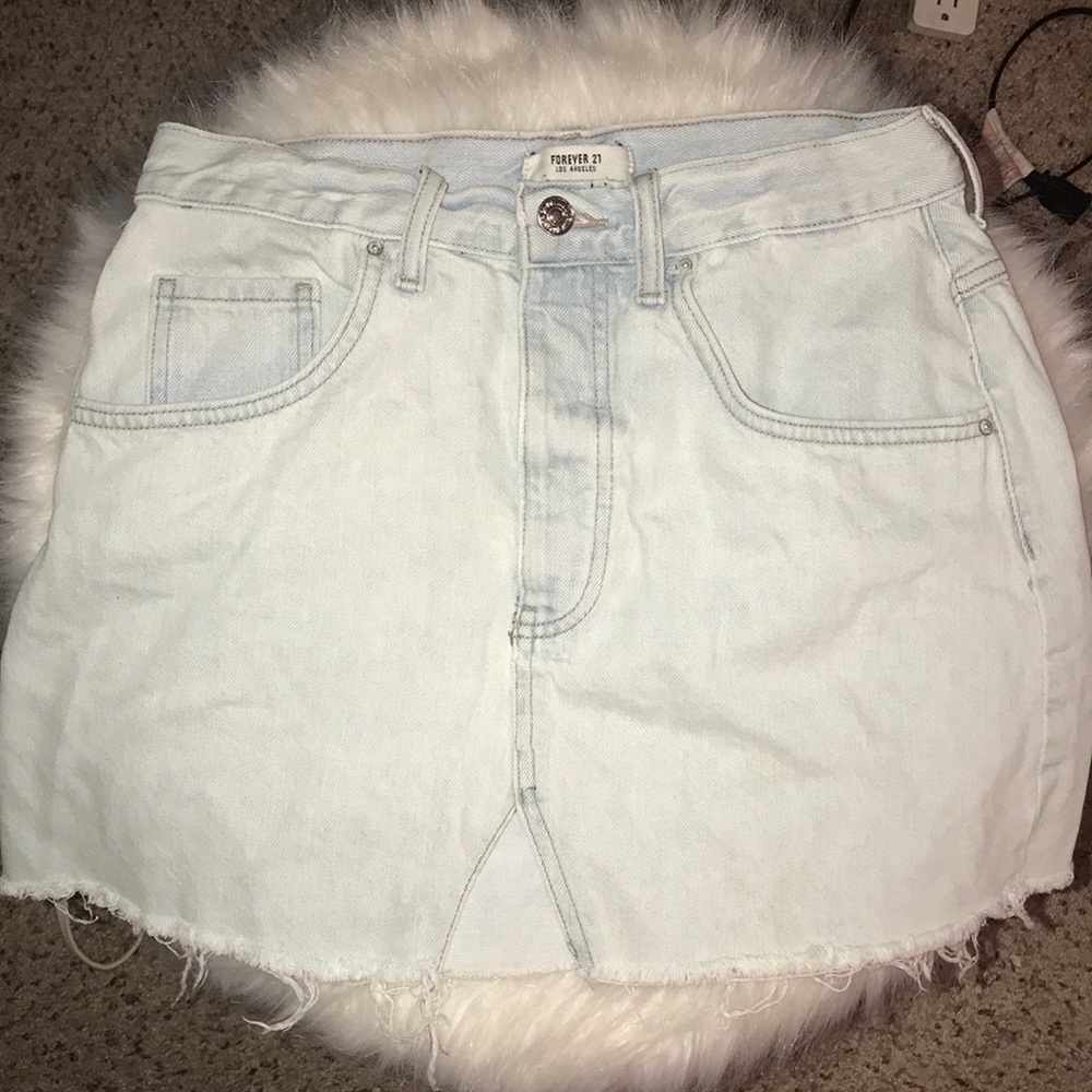 light wash jean skirt distressed hem